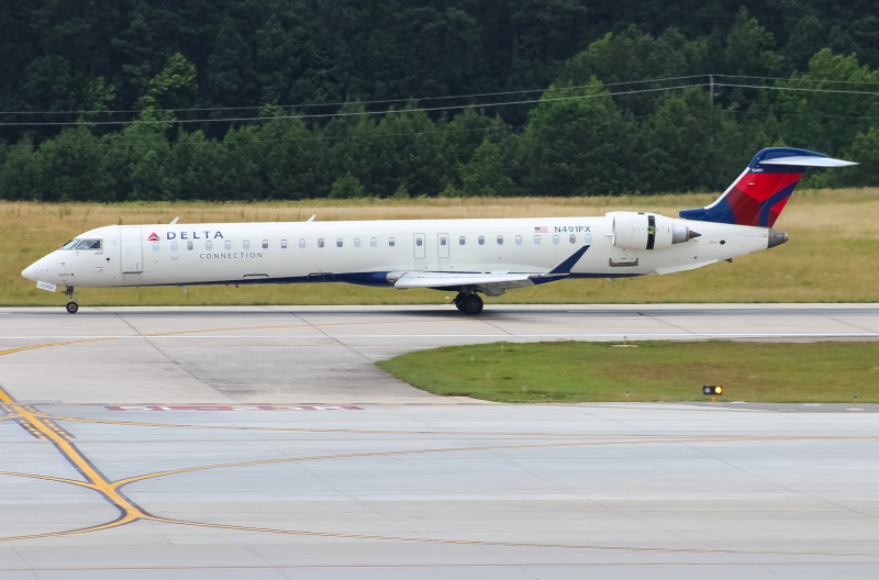 Photo of N491PX - Delta Connection Mitsubishi CRJ-900 at RDU on AeroXplorer Aviation Database