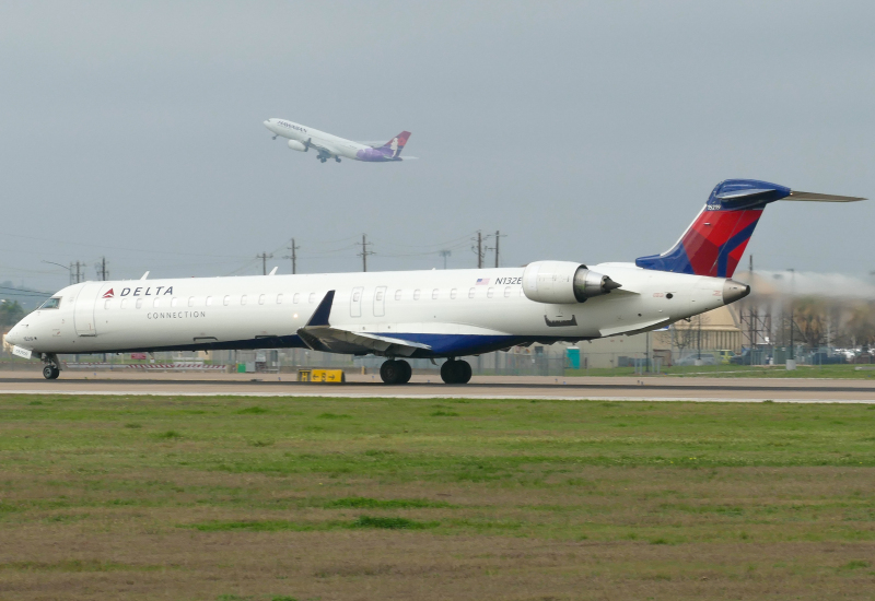 Photo of N132EV - Delta Connection Mitsubishi CRJ-900 at AUS on AeroXplorer Aviation Database