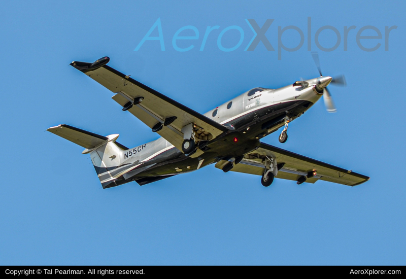 Photo of N55CH - Flying Zebra  Pilatus PC-12 at IAD on AeroXplorer Aviation Database