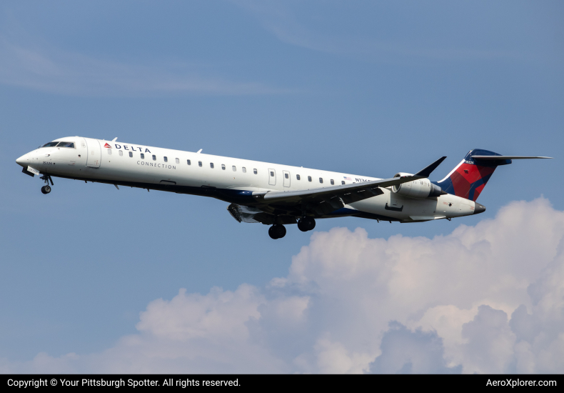 Photo of N136EV  - Delta Connection Mitsubishi CRJ-900 at PIT on AeroXplorer Aviation Database