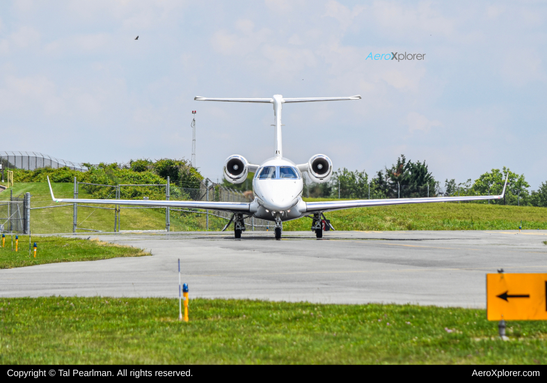 Photo of N300MG - PRIVATE Embraer Phenom 300 at GAI on AeroXplorer Aviation Database