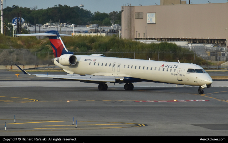 Photo of N931XJ - Delta Connection Mitsubishi CRJ-900 at JFK on AeroXplorer Aviation Database