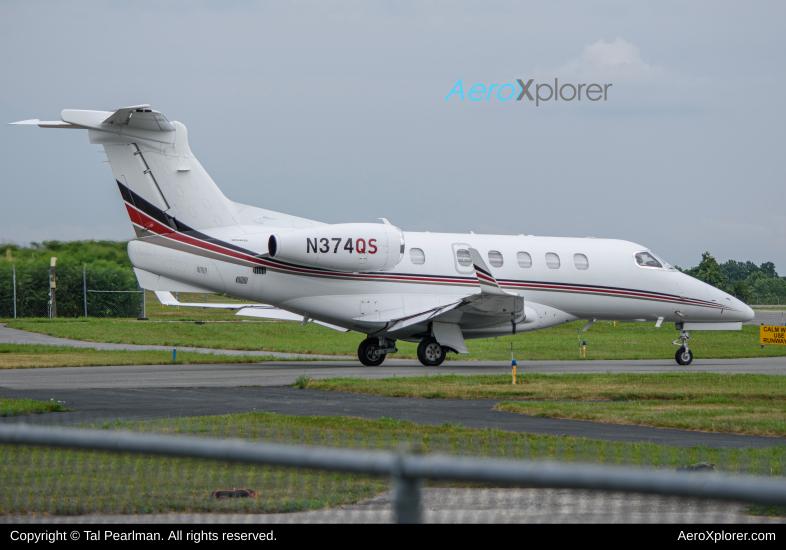 Photo of N374QS - NetJets Embraer Phenom 300 at GAI on AeroXplorer Aviation Database