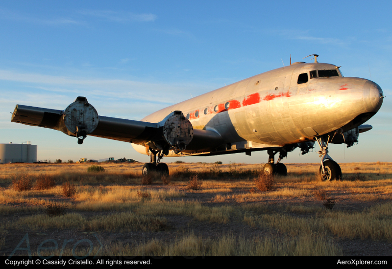 Photo of N67040 - Central Air Service Douglas C-54 Skymaster at KAVQ on AeroXplorer Aviation Database