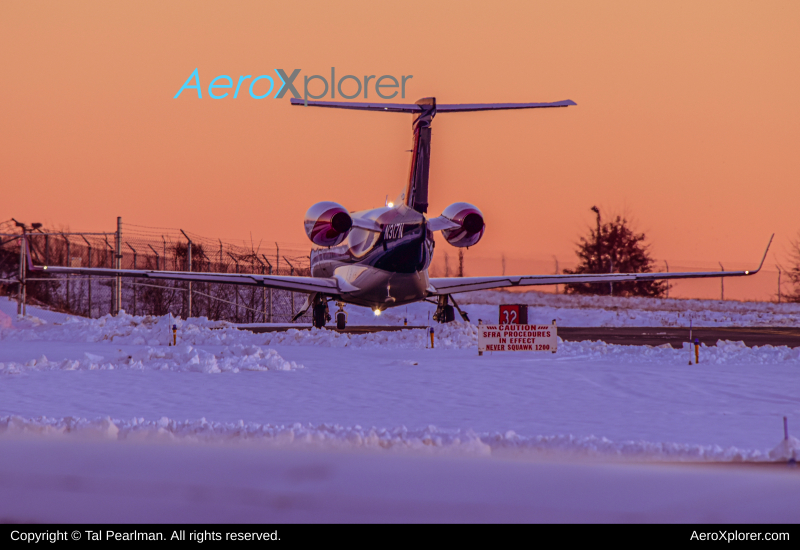 Photo of N317N - PRIVATE Embraer Phenom 300 at GAI on AeroXplorer Aviation Database