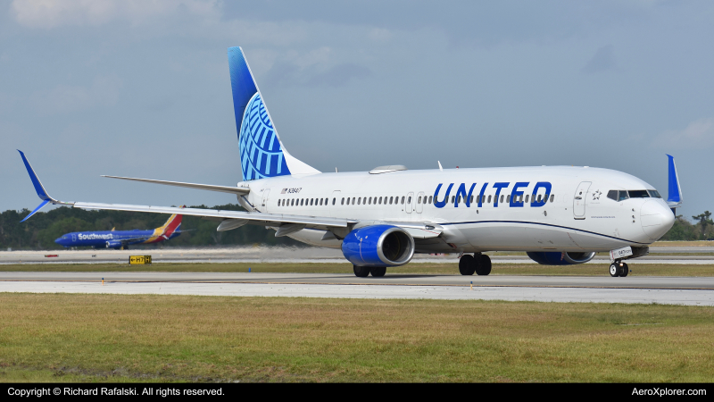 Photo of N38417 - United Airlines Boeing 737-900ER at MCO on AeroXplorer Aviation Database