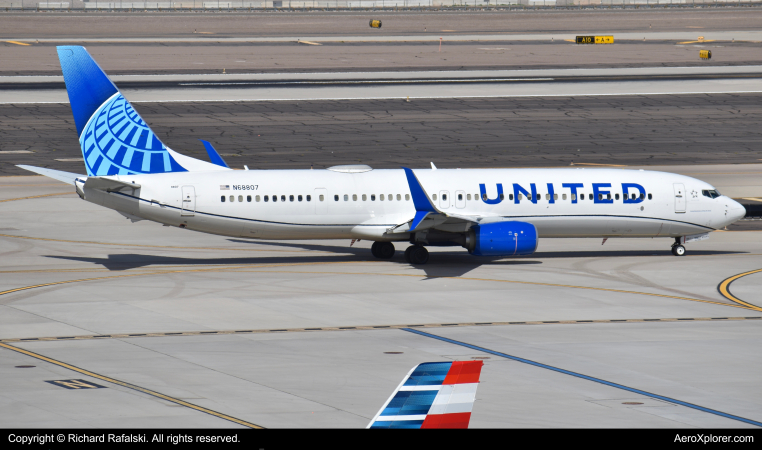 Photo of N68807 - United Airlines Boeing 737-900ER at PHX on AeroXplorer Aviation Database