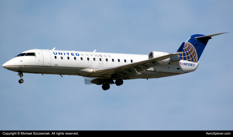 Photo of N925EV - United Express Mitsubishi CRJ-200 at ORD on AeroXplorer Aviation Database