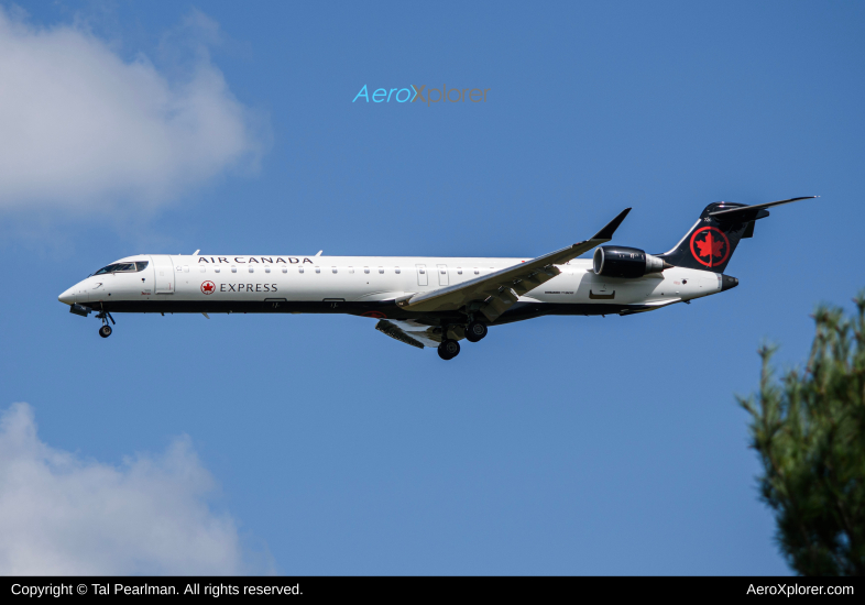 Photo of C-GJUZ - Air Canada Express Mitsubishi CRJ-900 at IAD on AeroXplorer Aviation Database