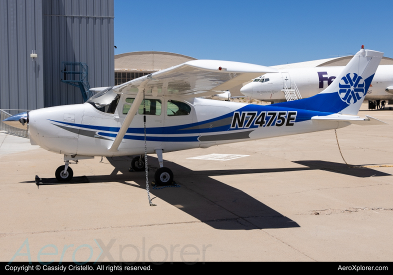 Photo of N7475E - Pima Community College Cessna 210 Centurion at TUS on AeroXplorer Aviation Database