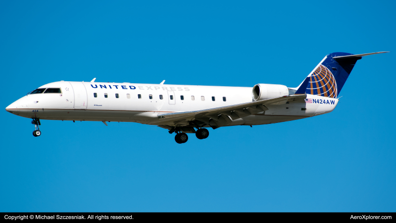 Photo of N424AW - United Express Mitsubishi CRJ-200 at ORD on AeroXplorer Aviation Database