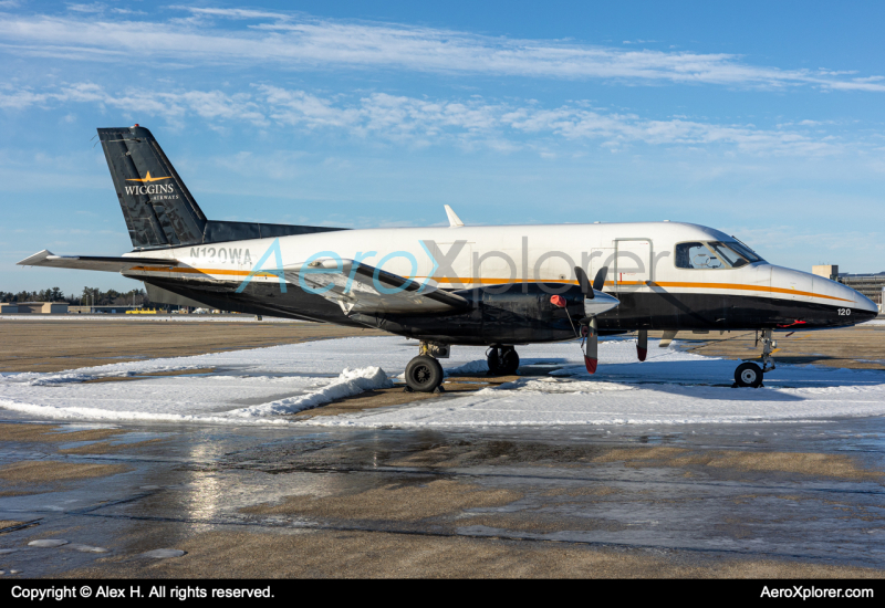 Photo of N120WA - Wiggins Airways Embraer E110 at MHT on AeroXplorer Aviation Database