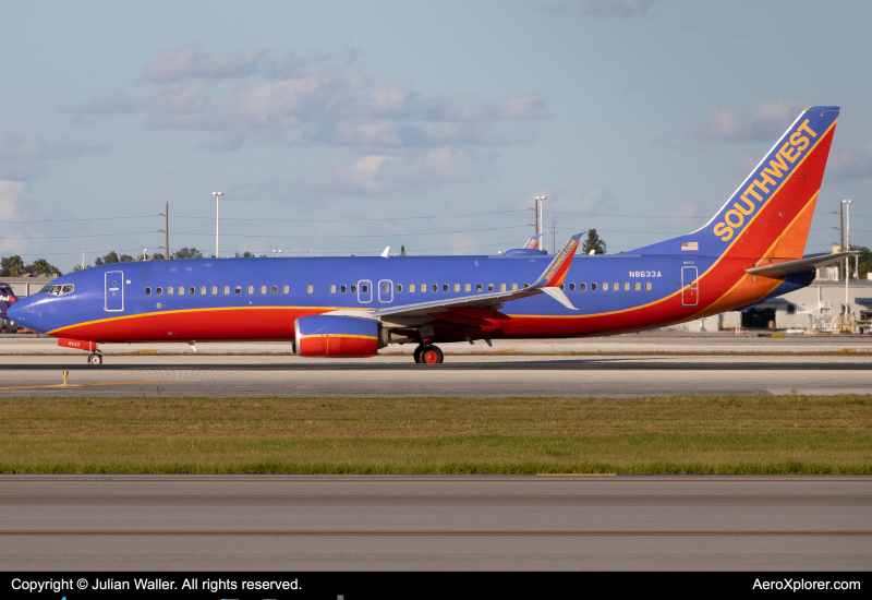 Photo of N8633A - Southwest Airlines Boeing 737-800 at MIA on AeroXplorer Aviation Database