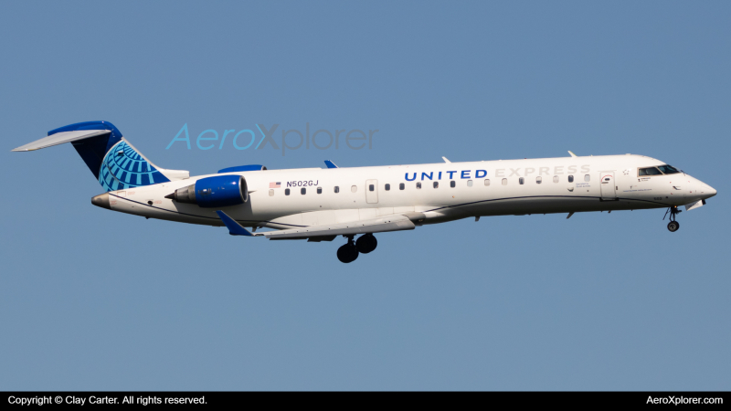 Photo of N502GJ - United Express Mitsubishi CRJ-550 at DCA on AeroXplorer Aviation Database