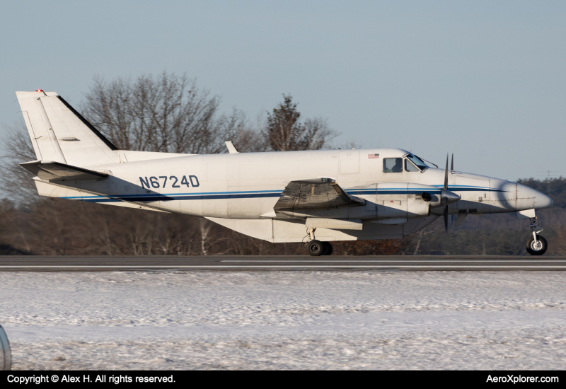 Photo of N6724D - Wiggins Airways Beechcraft C99 at MHT on AeroXplorer Aviation Database