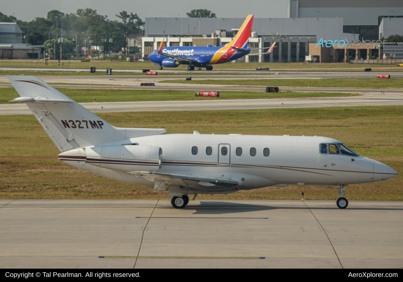 Photo of N327MP - PRIVATE Beechcraft Hawker 750 at HOU on AeroXplorer Aviation Database