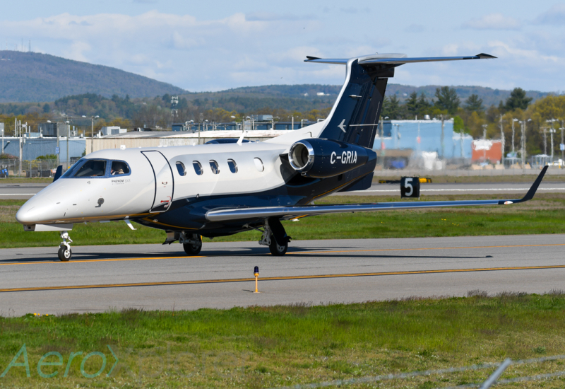 Photo of C-GRIA - PRIVATE Embraer Phenom 300 at MHT on AeroXplorer Aviation Database