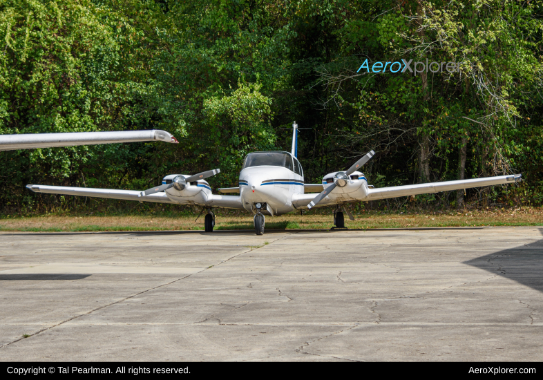 Photo of N7690Y - PRIVATE Piper 30 Twin Commanche at VKX on AeroXplorer Aviation Database