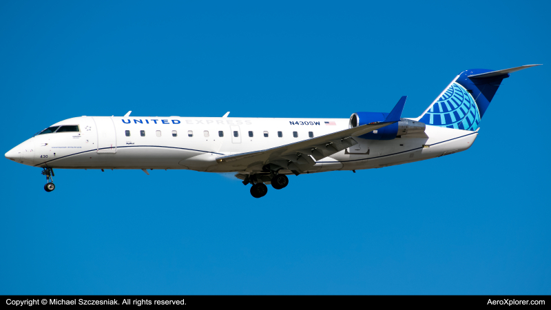 Photo of N430SW - United Express Mitsubishi CRJ-200 at ORD on AeroXplorer Aviation Database