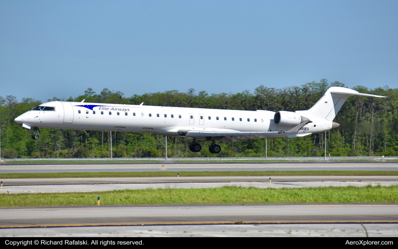 Photo of N900EA - Elite Airways Mitsubishi CRJ-900 at MCO on AeroXplorer Aviation Database