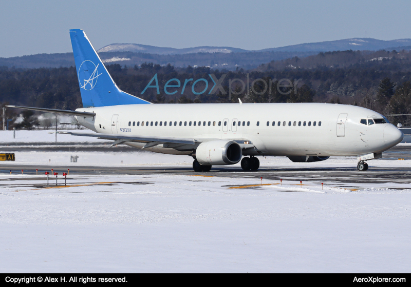 Photo of N313XA - iAero Boeing 737-400 at KMHT on AeroXplorer Aviation Database