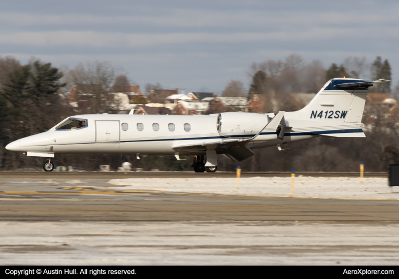 Photo of N412SW - PRIVATE Learjet 31 at AGC on AeroXplorer Aviation Database