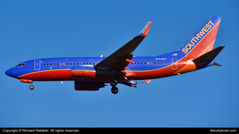 Photo of N242WN - Southwest Airlines Boeing 737-700 at MCO on AeroXplorer Aviation Database