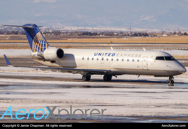 Photo of N975SW - United Express Mitsubishi CRJ-200 at DEN on AeroXplorer Aviation Database