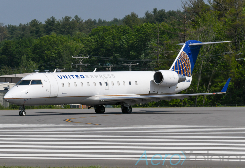 Photo of N461AW - United Express Mitsubishi CRJ-200 at MHT on AeroXplorer Aviation Database