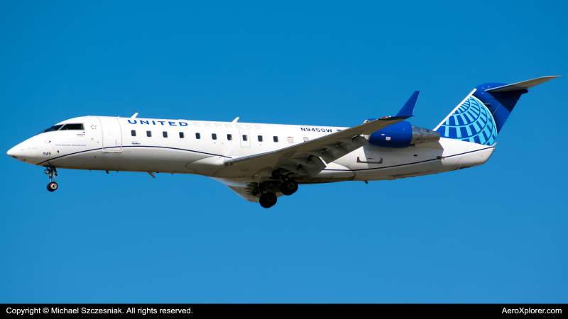 Photo of N945SW - United Express Mitsubishi CRJ-200 at ORD on AeroXplorer Aviation Database