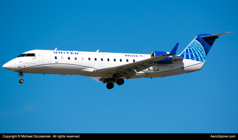 Photo of N963SW - United Express Mitsubishi CRJ-200 at ORD on AeroXplorer Aviation Database