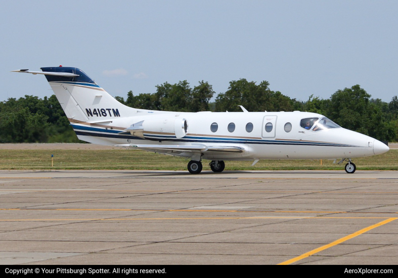 Photo of N418TM  - Private  Beechcraft Hawker 400 at AGC on AeroXplorer Aviation Database