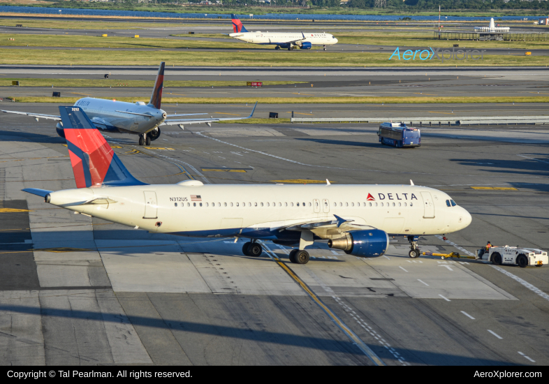 Photo of N312US - Delta Airlines Airbus A320-211 at JFK on AeroXplorer Aviation Database