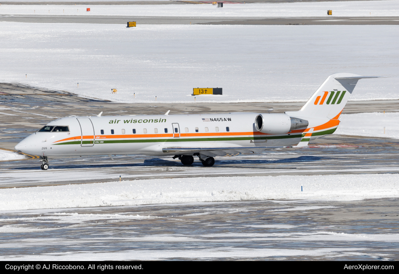 Photo of N465AW - United Express Mitsubishi CRJ-200 at MKE on AeroXplorer Aviation Database