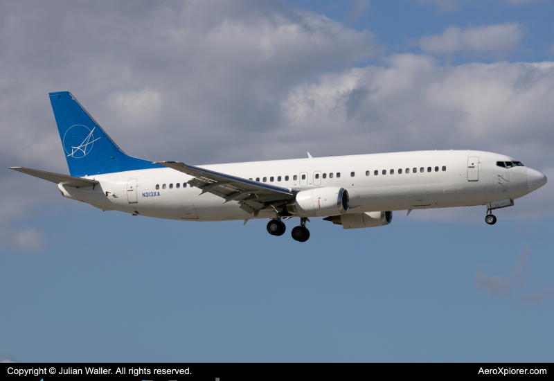 Photo of N313XA - iAero Boeing 737-400 at MIA on AeroXplorer Aviation Database