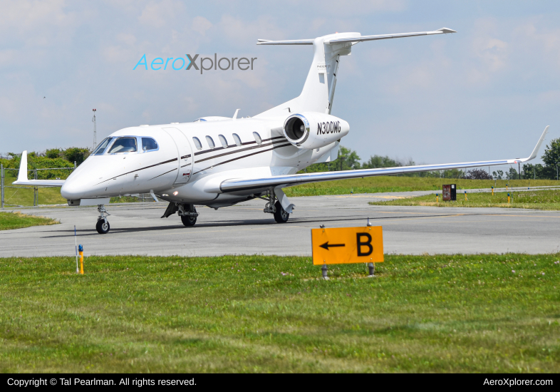 Photo of N300MG - PRIVATE Embraer Phenom 300 at GAI on AeroXplorer Aviation Database