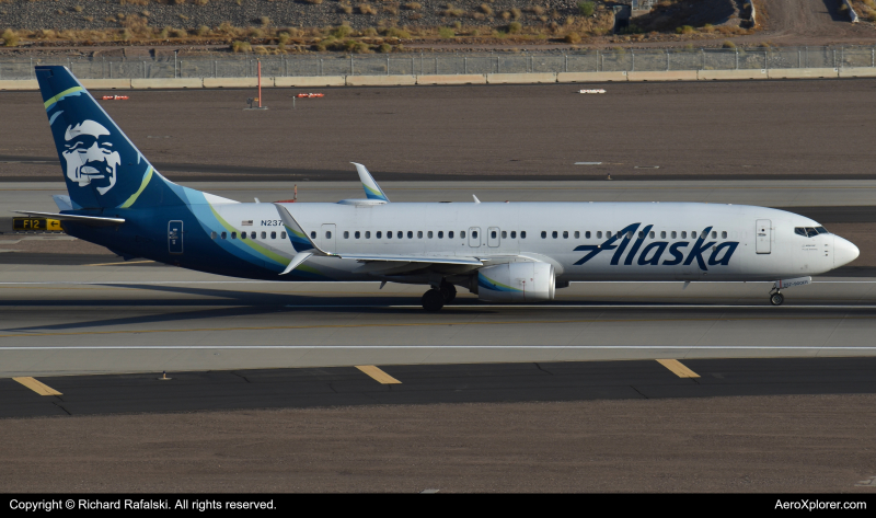 Photo of N237AK - Alaska Airlines Boeing 737-900ER at PHX on AeroXplorer Aviation Database
