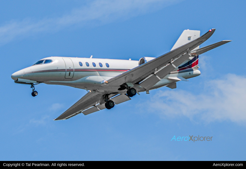 Photo of N553QS - NetJets Cessna 680 Citation Sovereign  at IAD on AeroXplorer Aviation Database