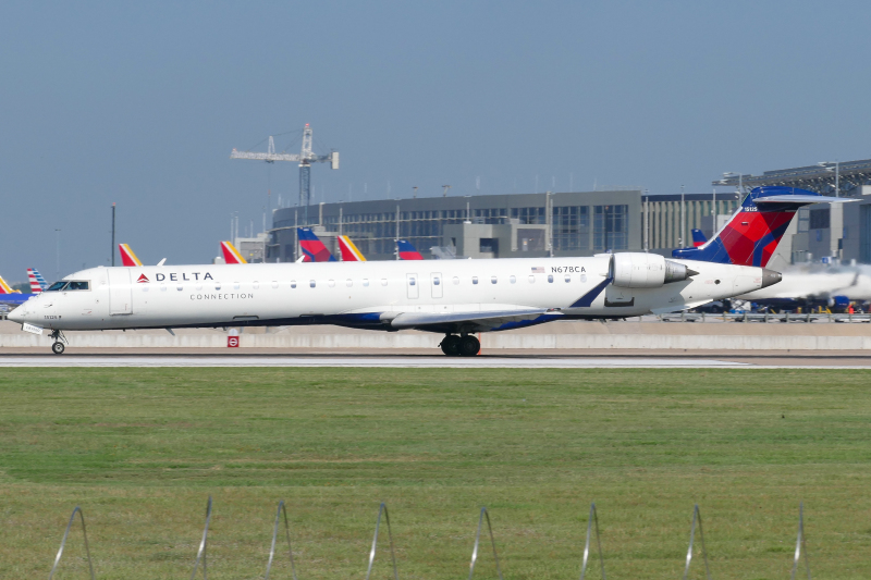 Photo of N678CA - Delta Connection Mitsubishi CRJ-900 at AUS on AeroXplorer Aviation Database