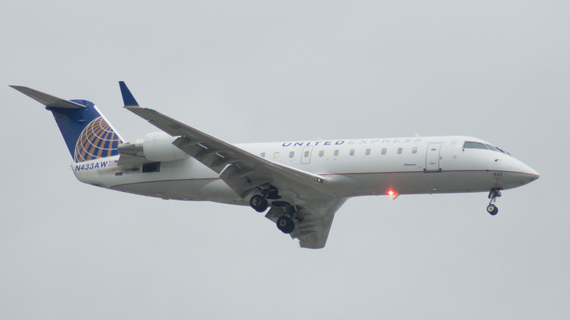 Photo of N433AW - United Express Mitsubishi CRJ-200 at ORD on AeroXplorer Aviation Database