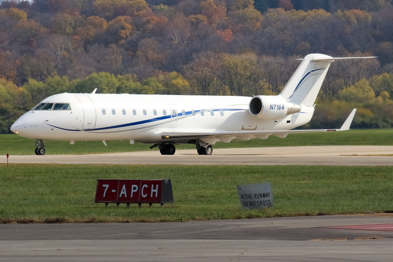 Photo of N7164 - PRIVATE  Mitsubishi CRJ-200 at LUK on AeroXplorer Aviation Database