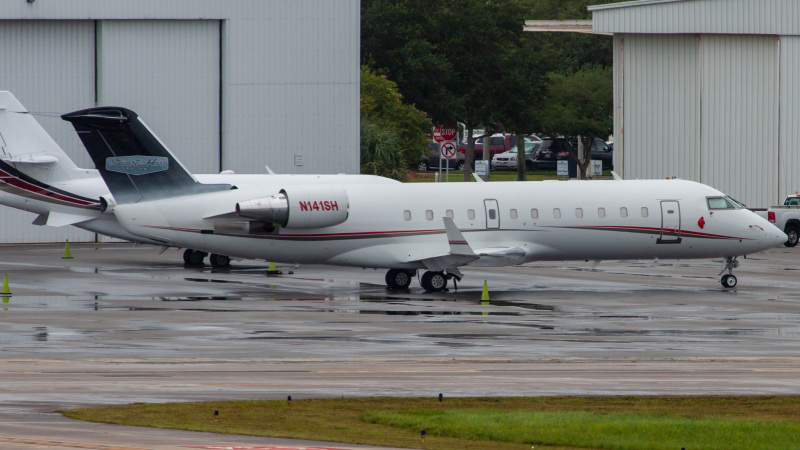 Photo of N141SH - PRIVATE Mitsubishi CRJ-200 at DAB on AeroXplorer Aviation Database