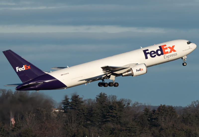 Photo of N136FE - FedEx Boeing 767-300F at MHT on AeroXplorer Aviation Database
