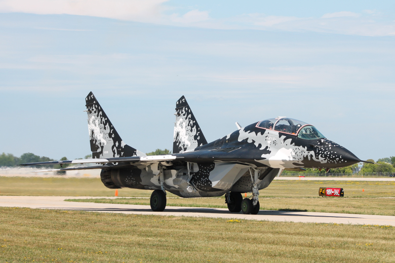 Photo of N29UB - PRIVATE Mikoyan-Gurevich MiG-29 at OSH on AeroXplorer Aviation Database