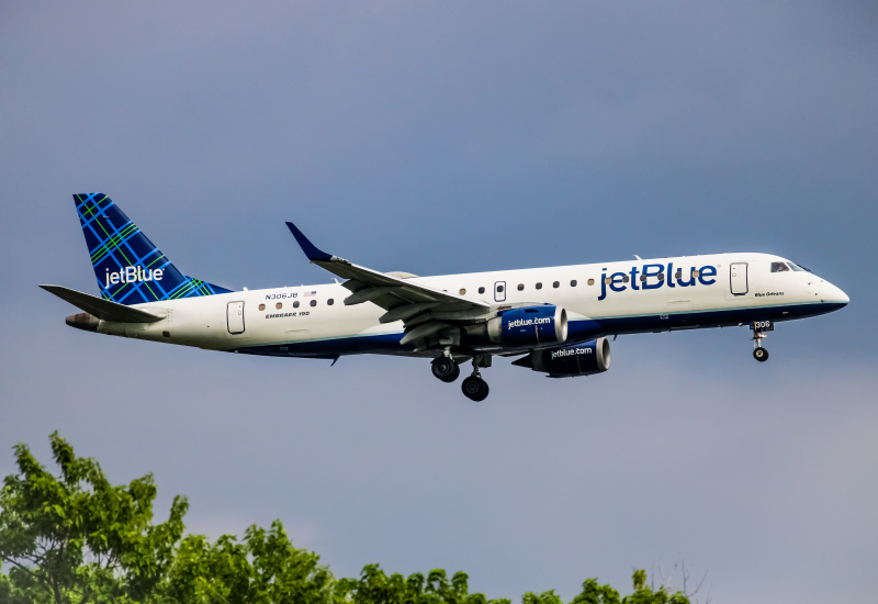 Photo of N306JB - JetBlue Airways Embraer E190 at JFK on AeroXplorer Aviation Database