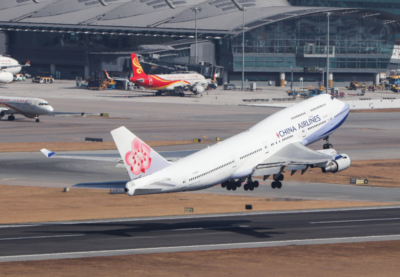 Photo of B-18215 - China Airlines Boeing 747-400 at HKG on AeroXplorer Aviation Database