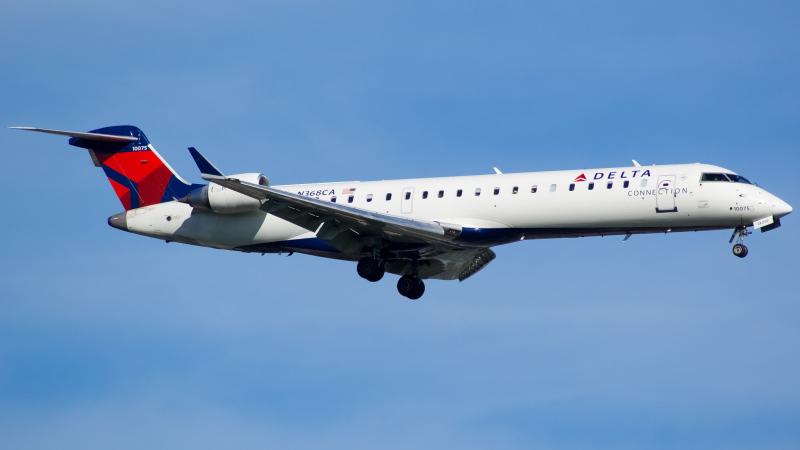 Photo of N368CA - Delta Connection Mitsubishi CRJ-700 at JFK on AeroXplorer Aviation Database