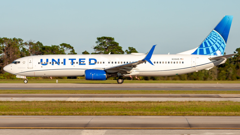 Photo of N39415 - United Airlines Boeing 737-900ER at MCO on AeroXplorer Aviation Database