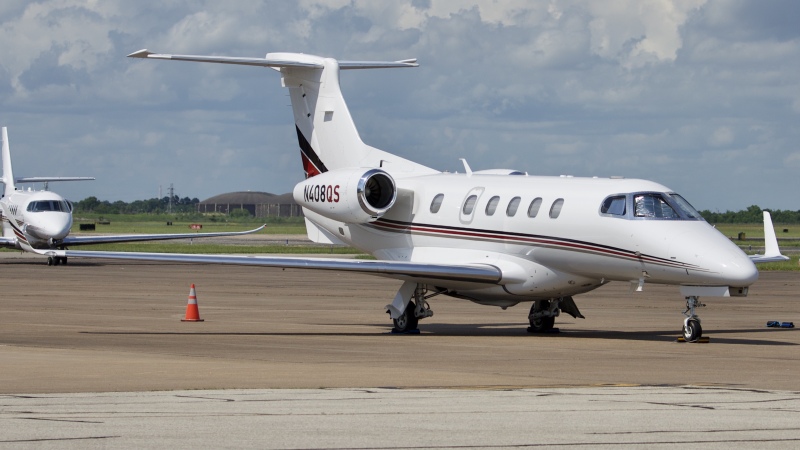 Photo of N408QS - PRIVATE Embraer Phenom 300 at EFD on AeroXplorer Aviation Database
