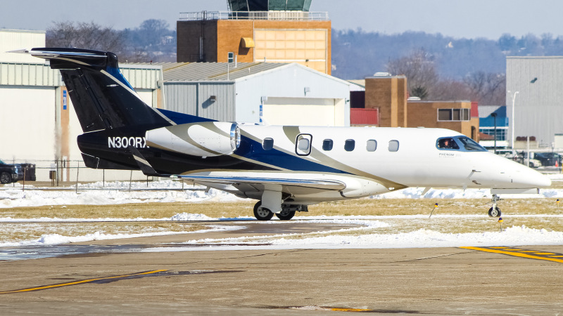 Photo of N300RX - PRIVATE  Embraer Phenom 300 at LUK on AeroXplorer Aviation Database